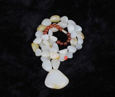 新疆和田玉黄皮一级白玉籽玉原石项链 78克